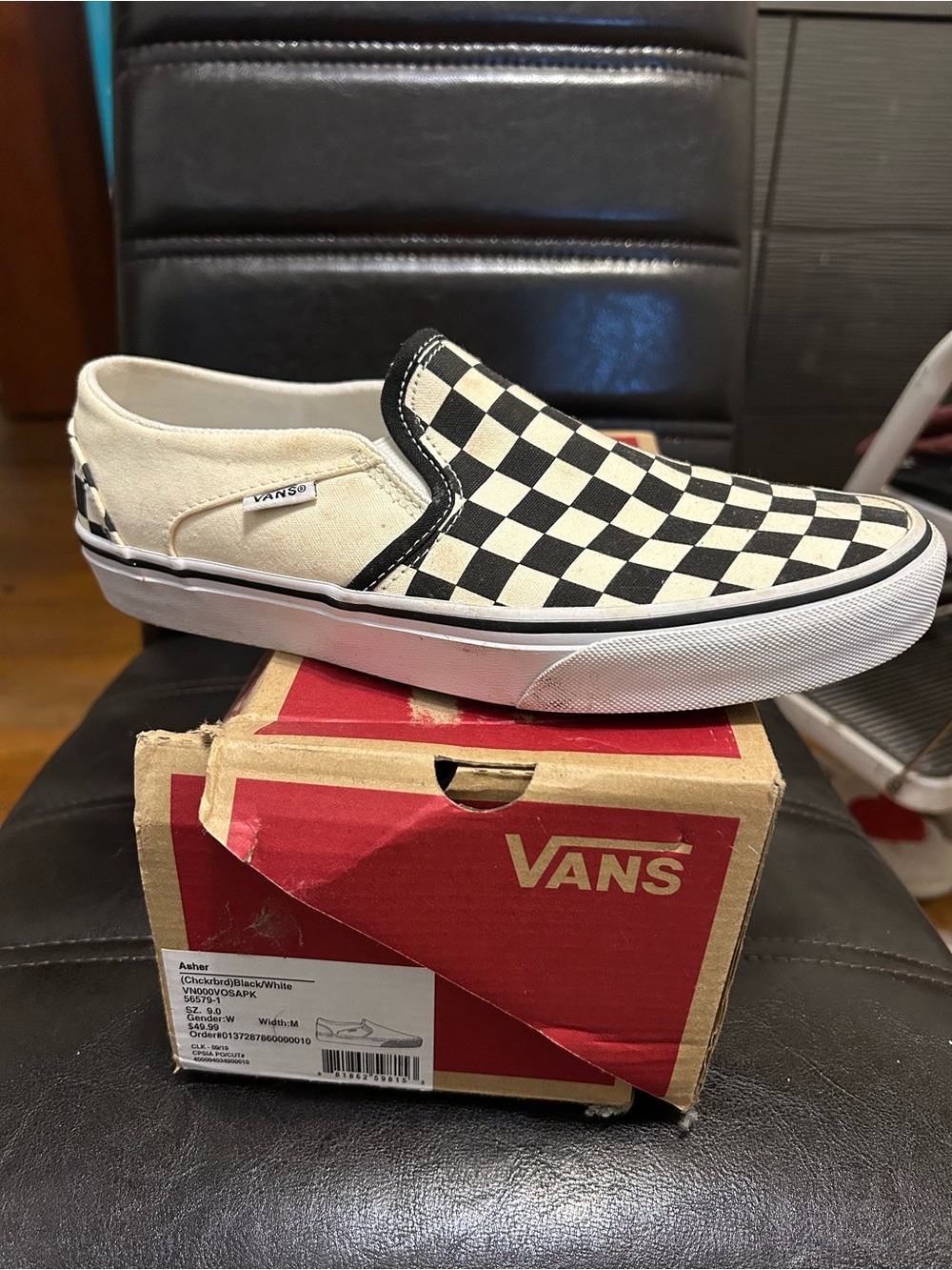 Vans Checkerboard Slip-On in Black and White - women